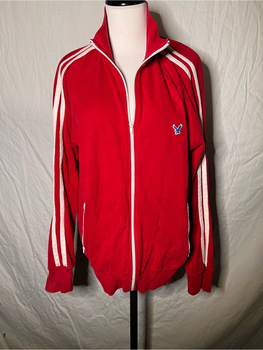 American Eagle Red Track Jacket with White Stripes and Blue Eagle Patch